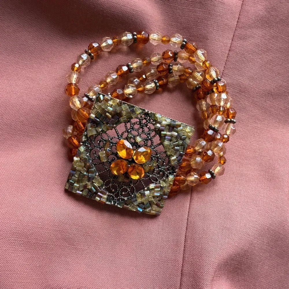 Y2K Multi-stranded Bracelet with a faux Amber Glass, Gems Statement Pendant